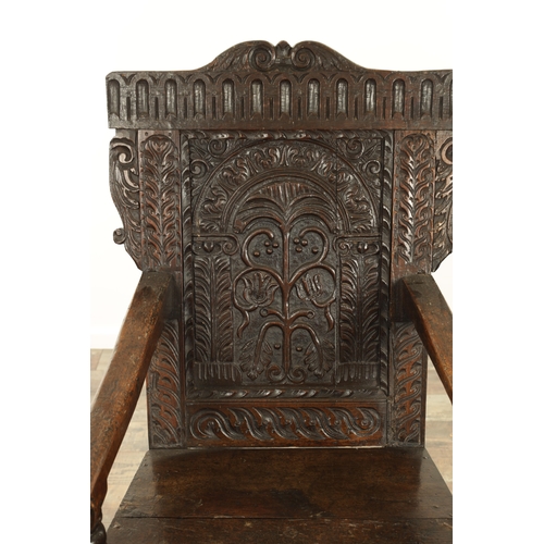 1356 - A GOOD LATE 17TH CENTURY JOINED OAK WAINSCOT CHAIR with scrolled leaf-carved crest and matching ears... 