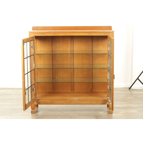 1357 - AN UNUSUAL ROBERT ‘MOUSEMAN’ THOMPSON JOINED ADZED LIGHT OAK SIDE CABINET the rear galleried top abo... 