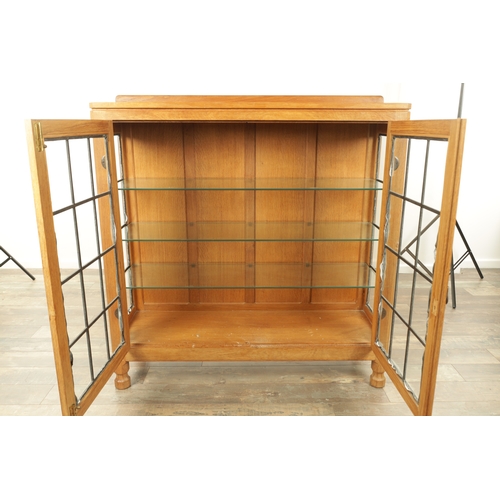 1357 - AN UNUSUAL ROBERT ‘MOUSEMAN’ THOMPSON JOINED ADZED LIGHT OAK SIDE CABINET the rear galleried top abo... 