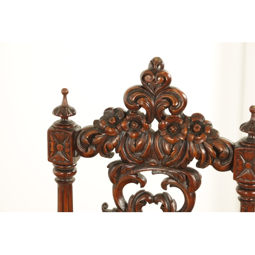 1360 - A PAIR OF 19TH CENTURY CARVED WALNUT SIDE CHAIRS with leaf carved backs and tapering leg supports (4... 