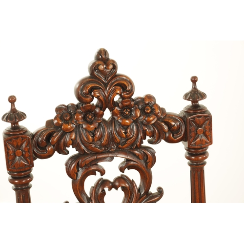 1360 - A PAIR OF 19TH CENTURY CARVED WALNUT SIDE CHAIRS with leaf carved backs and tapering leg supports (4... 