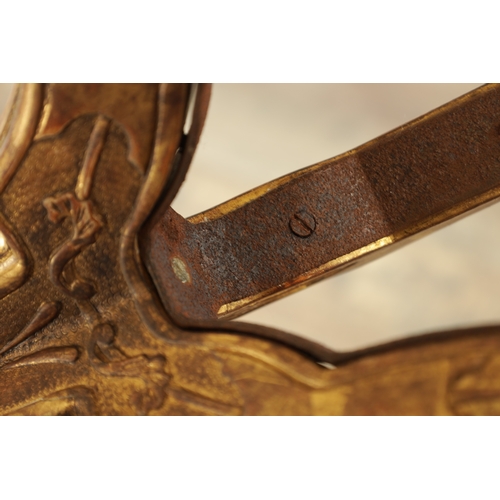 1363 - A DECORATIVE GILT GESSO GOTHIC STYLE OCCASIONAL TABLE with leaf-carved decoration raised on a tripod... 