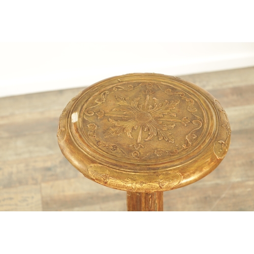 1363 - A DECORATIVE GILT GESSO GOTHIC STYLE OCCASIONAL TABLE with leaf-carved decoration raised on a tripod... 