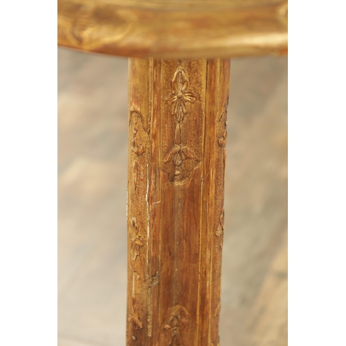 1363 - A DECORATIVE GILT GESSO GOTHIC STYLE OCCASIONAL TABLE with leaf-carved decoration raised on a tripod... 