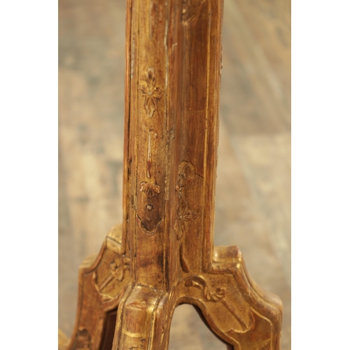 1363 - A DECORATIVE GILT GESSO GOTHIC STYLE OCCASIONAL TABLE with leaf-carved decoration raised on a tripod... 