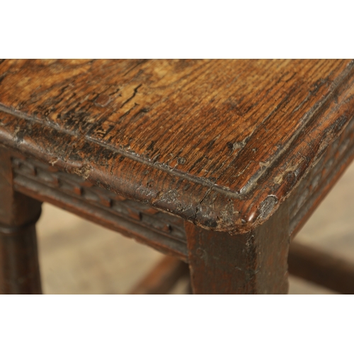 1364 - A LATE 17TH CENTURY JOINED OAK JOINT STOOL with plank top above a ring turned base joined by stretch... 