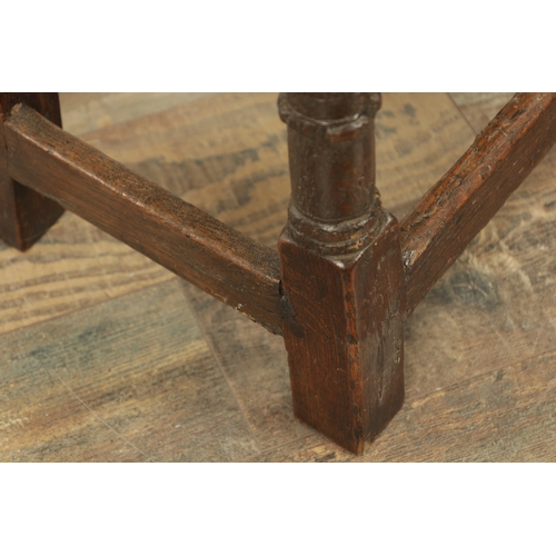 1364 - A LATE 17TH CENTURY JOINED OAK JOINT STOOL with plank top above a ring turned base joined by stretch... 