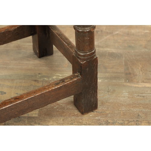 1364 - A LATE 17TH CENTURY JOINED OAK JOINT STOOL with plank top above a ring turned base joined by stretch... 