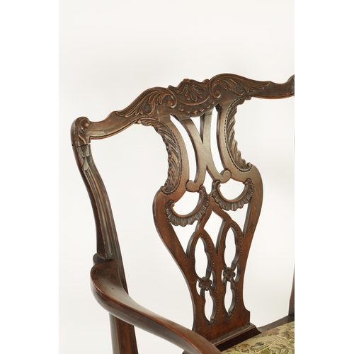 1365 - A MID 18TH CENTURY CHIPPENDALE STYLE MAHOGANY OPEN ARMCHAIR OF GENEROUS SIZE with leaf carved C scro... 