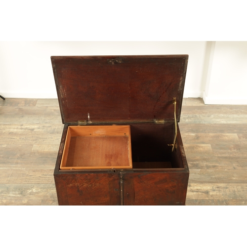 1366 - A GEORGE III MAHOGANY CELLARETTE ON STAND with hinged top and side carrying handles; raised on squar... 