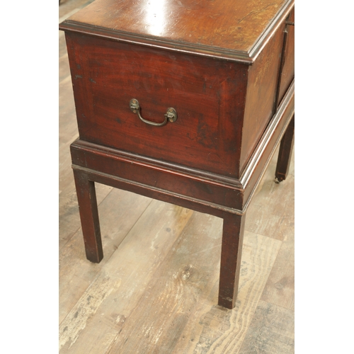 1366 - A GEORGE III MAHOGANY CELLARETTE ON STAND with hinged top and side carrying handles; raised on squar... 