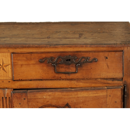 1374 - AN 18TH CENTURY WALNUT MALTESE COMMODE with two frieze drawers above fielded hinged cupboard doors r... 