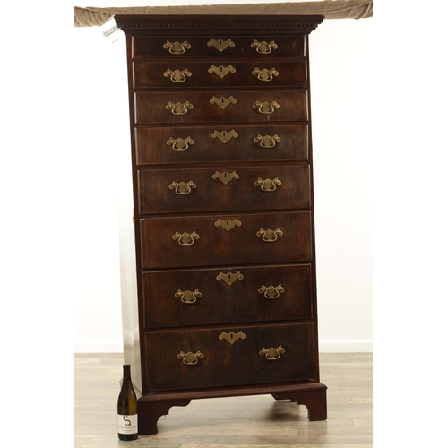 1375 - AN 18TH CENTURY MAHOGANY IRISH TALL CHEST OF DRAWERS having dentil cornice above a bank of eight gra... 