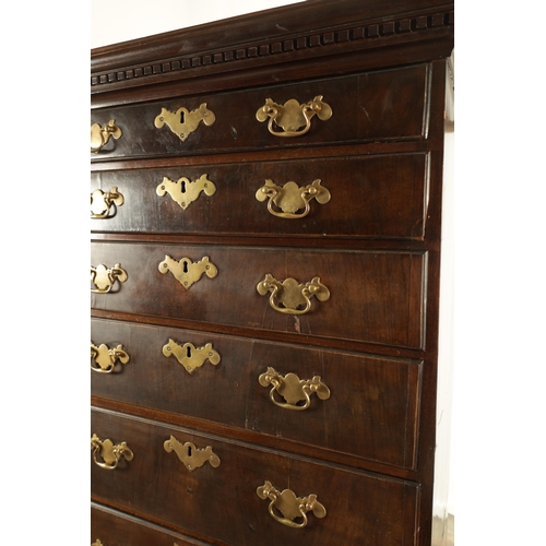 1375 - AN 18TH CENTURY MAHOGANY IRISH TALL CHEST OF DRAWERS having dentil cornice above a bank of eight gra... 