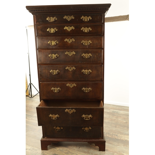 1375 - AN 18TH CENTURY MAHOGANY IRISH TALL CHEST OF DRAWERS having dentil cornice above a bank of eight gra... 