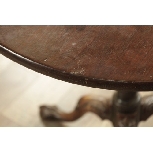 1378 - A GEORGE III MAHOGANY TILT TOP TABLE with one piece figured top above a bird cage base with tapering... 