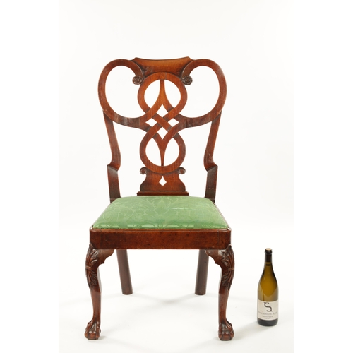 1386 - A MID 18TH CENTURY WALNUT SIDE CHAIR IN THE MANNER OF ROBERT MAINWARING the shaped interlaced scroll... 