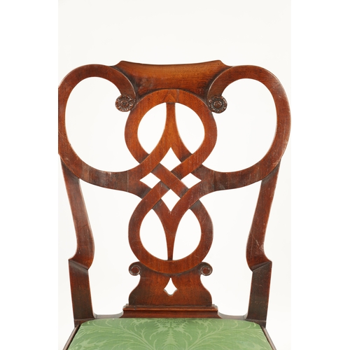 1386 - A MID 18TH CENTURY WALNUT SIDE CHAIR IN THE MANNER OF ROBERT MAINWARING the shaped interlaced scroll... 