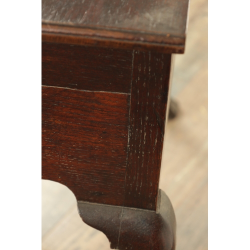 1393 - A GEORGE II OAK LOWBOY with moulded edge top fitted pullout candle side to one side above three frie... 