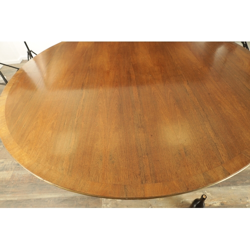 1394 - A LARGE SIX FOOT GEORGE III-STYLE TWELVE SEATER FIGURED ROSEWOOD CIRCULAR DINING TABLE with cross-ba... 