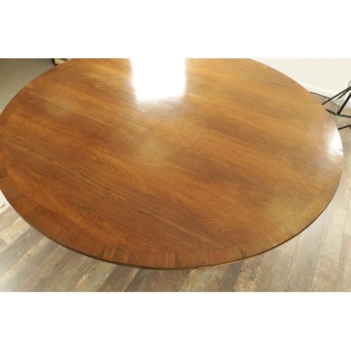 1394 - A LARGE SIX FOOT GEORGE III-STYLE TWELVE SEATER FIGURED ROSEWOOD CIRCULAR DINING TABLE with cross-ba... 