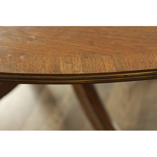 1394 - A LARGE SIX FOOT GEORGE III-STYLE TWELVE SEATER FIGURED ROSEWOOD CIRCULAR DINING TABLE with cross-ba... 