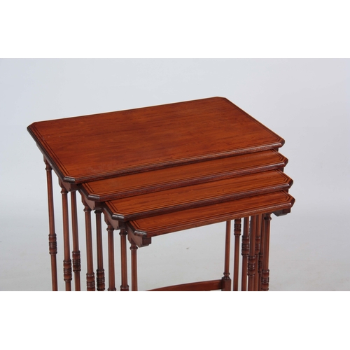 1398 - A NEST OF FOUR EARLY 20TH CENTURY SATINWOOD AND MAHOGANY INLAID OCCASIONAL TABLES the rectangular to... 