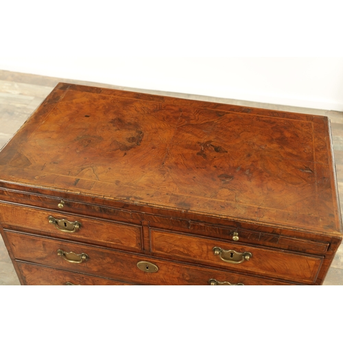 1399 - A GEORGE I FIGURED WALNUT BACHELORS CHEST with quarter veneered cross-banded caddy top above a brush... 