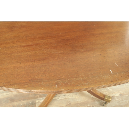 1403 - A GEORGE III MAHOGANY OVAL TILT TOP BREAKFAST TABLE with one piece top raised on a gun barrel stem w... 