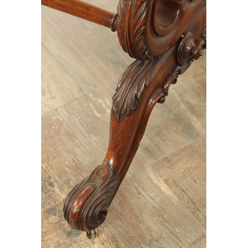 1416 - A VICTORIAN BURR WALNUT SERPENTINE SHAPED LIBRARY TABLE with moulded edge top above leaf carved end ... 