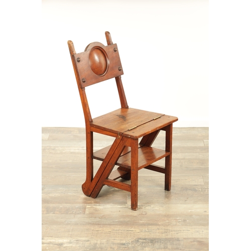 1420 - AN ARTS AND CRAFTS WALNUT METAMORPHIC LIBRARY CHAIR / STEPS with roundel shaped back above a hinged ... 