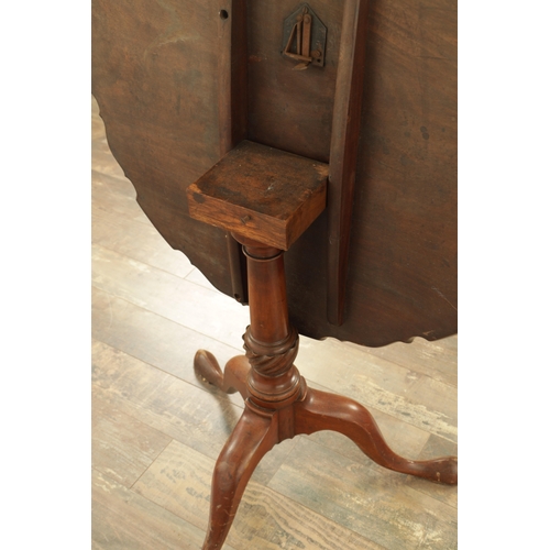 1422 - A GEORGE III MAHOGANY TILT-TOP TABLE with one piece pie crust top above a tapering stem with cabriol... 