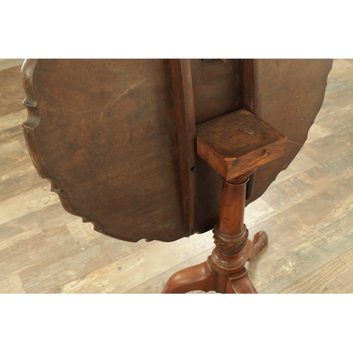 1422 - A GEORGE III MAHOGANY TILT-TOP TABLE with one piece pie crust top above a tapering stem with cabriol... 