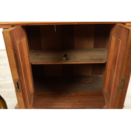 1425 - A LATE 19TH CENTURY WALNUT DENTIST'S CABINET, the top section with a rounded front tambour top above... 