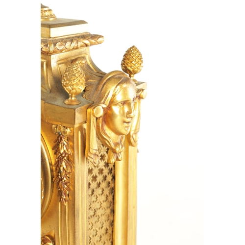 969 - A LATE 19TH CENTURY FRENCH ORMOLU MANTEL CLOCK with large urn and swag finial above column case with... 