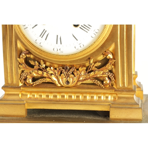 969 - A LATE 19TH CENTURY FRENCH ORMOLU MANTEL CLOCK with large urn and swag finial above column case with... 