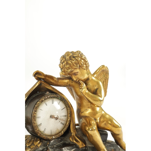 970 - A REGENCY ENGLISH BRONZE AND GILT BRONZE SMALL MANTEL CLOCK modelled with a cherub laying in a natur... 