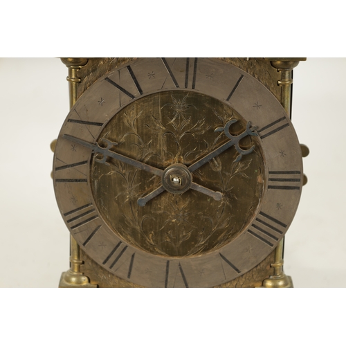 971 - A BRASS WEIGHT DRIVEN LANTERN CLOCK with a silvered chapter ring and 30-hour movement striking on a ... 