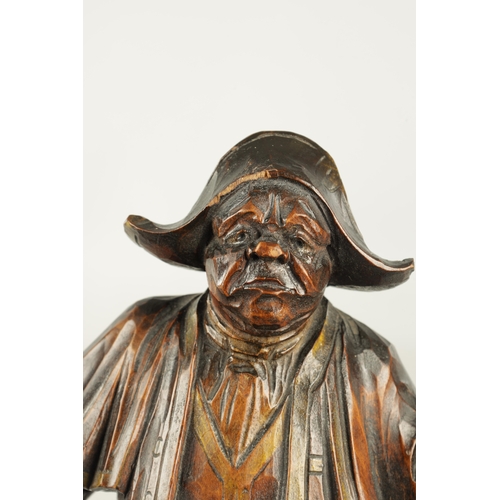 974 - A LATE 19TH CENTURY CARVED BLACK FOREST FIGURAL CLOCK FROM THE OLIVER TWIST NOVEL, modelled as Mr Bu... 