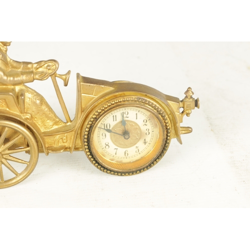 977 - A LATE 19TH CENTURY ENGLISH NOVELTY DESK CLOCK formed as a gilt well-dressed gentleman stood next to... 