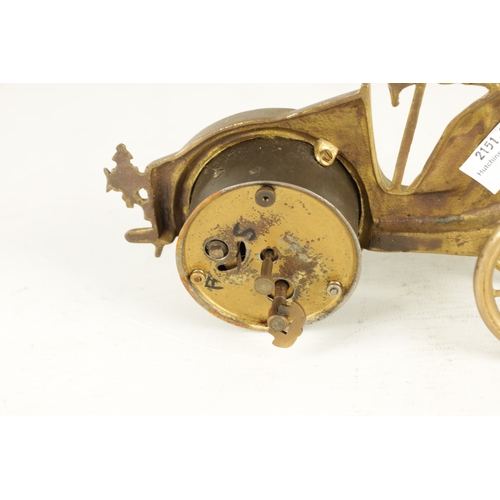 977 - A LATE 19TH CENTURY ENGLISH NOVELTY DESK CLOCK formed as a gilt well-dressed gentleman stood next to... 