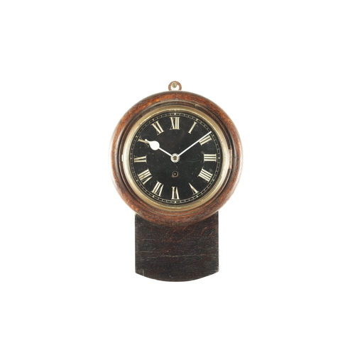 979 - A 19TH CENTURY 8” OAK CASED DROP DIAL WALL CLOCK with cast bezel and rounded base, enclosing an 8