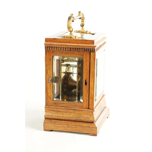 984 - A FINE REGENCY ROSEWOOD ENGLISH FUSEE LIBRARY CLOCK with gilt brass rococo style handle above a beve... 