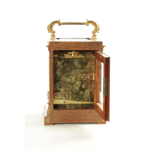 984 - A FINE REGENCY ROSEWOOD ENGLISH FUSEE LIBRARY CLOCK with gilt brass rococo style handle above a beve... 