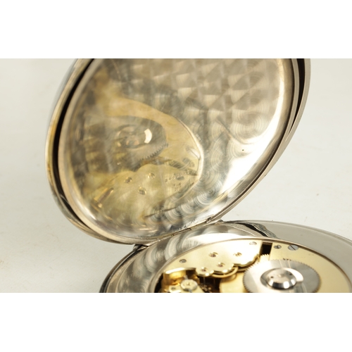 988 - A 20TH CENTURY GOLIATH SIZED NICKEL CASED POCKET WATCH enclosing an enamel dial with Arabic numerals... 