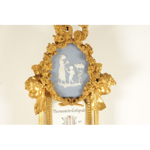 997 - A FINE MATCHED PAIR OF 19TH CENTURY FRENCH GILT BRONZE AND WEDGWOOD PANELLED HANGING WHEEL BAROMETER... 