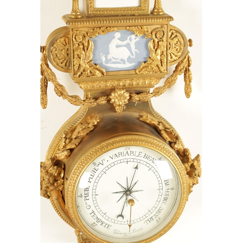 997 - A FINE MATCHED PAIR OF 19TH CENTURY FRENCH GILT BRONZE AND WEDGWOOD PANELLED HANGING WHEEL BAROMETER... 