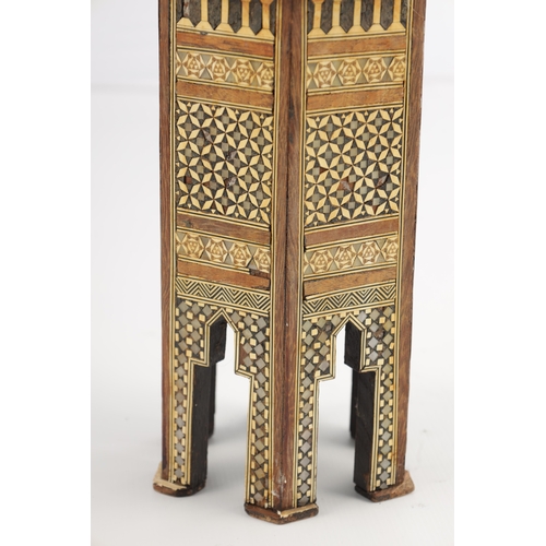 256 - A 19TH CENTURY MINIATURE ISLAMIC INLAID BONE AND MOTHER OF PEARL TABLE having a hexagonal shaped top... 