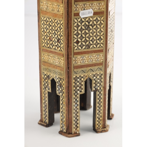 256 - A 19TH CENTURY MINIATURE ISLAMIC INLAID BONE AND MOTHER OF PEARL TABLE having a hexagonal shaped top... 