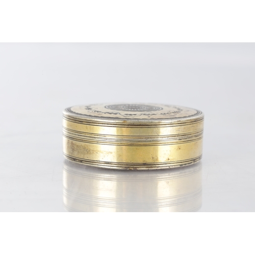 105 - AN EARLY 19TH CENTURY FRENCH SILVER GILT CIRCULAR SNUFF BOX with engraved floral decoration - hallma... 